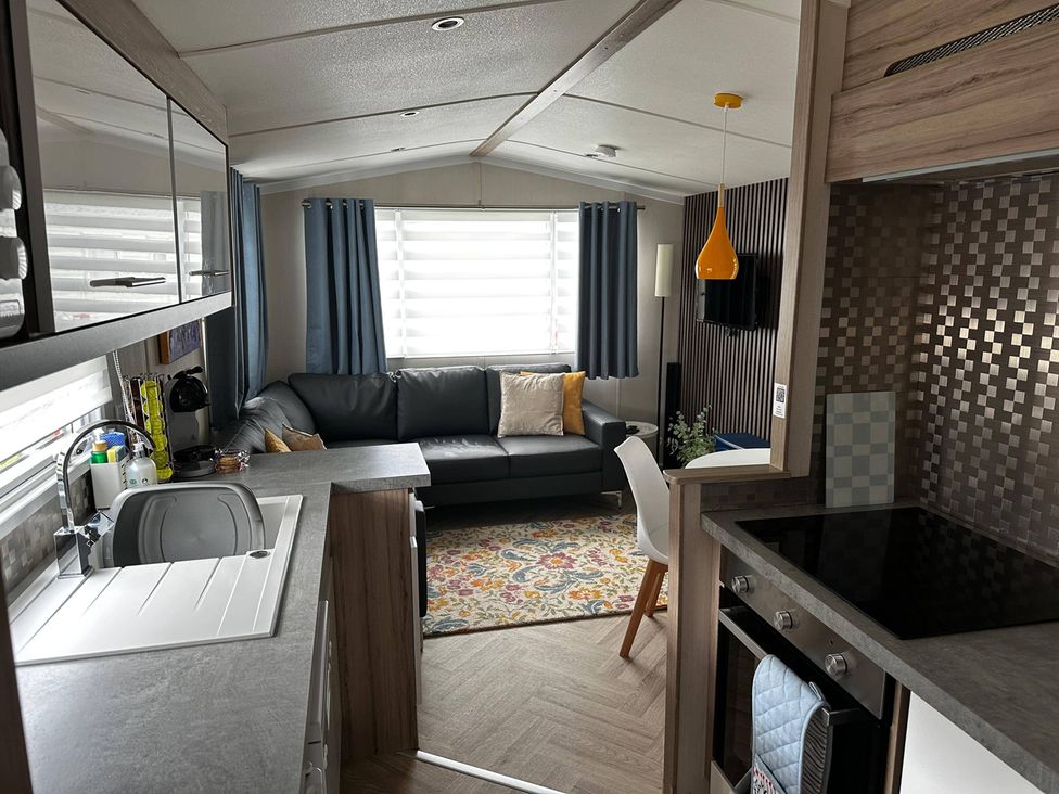 A living room with a sofa and coffee table at the property