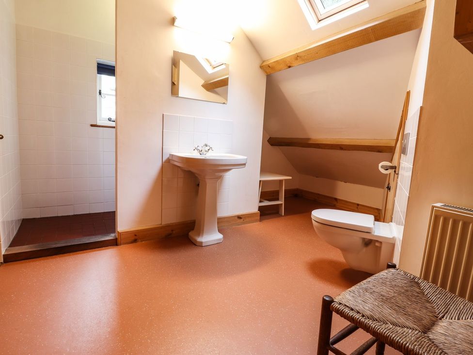 A bathroom with a sink and toilet at Llys Gwaun in Fishguard