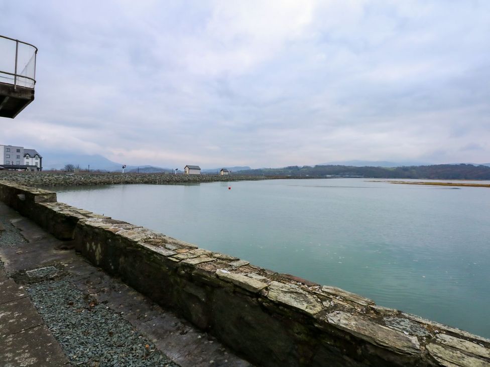 A view of a body of water and surrounding buildings at Aldena South Snowdon Wharf Porthmadog