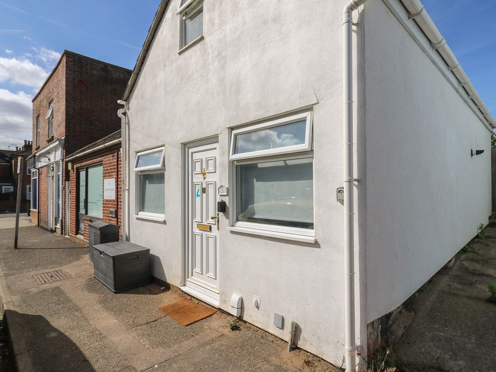An outdoor view of a white building situated at 2B Granville Road in Colchester