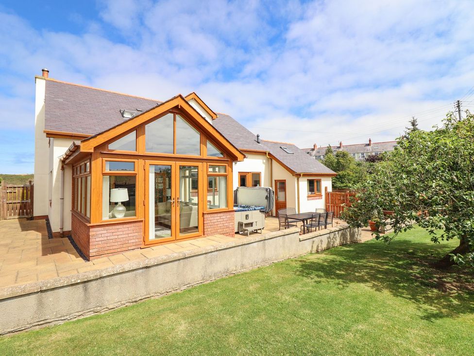 A house with a patio and garden at Ger Y Mor, Cemaes Bay
