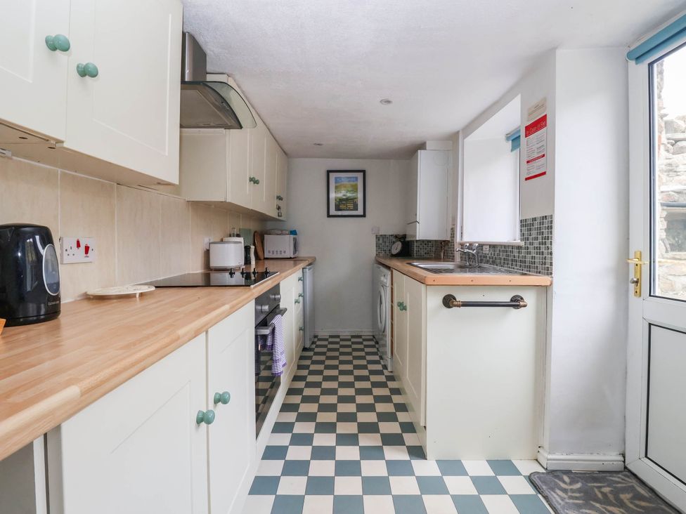 A kitchen with cabinets and appliances at South View in Richmond
