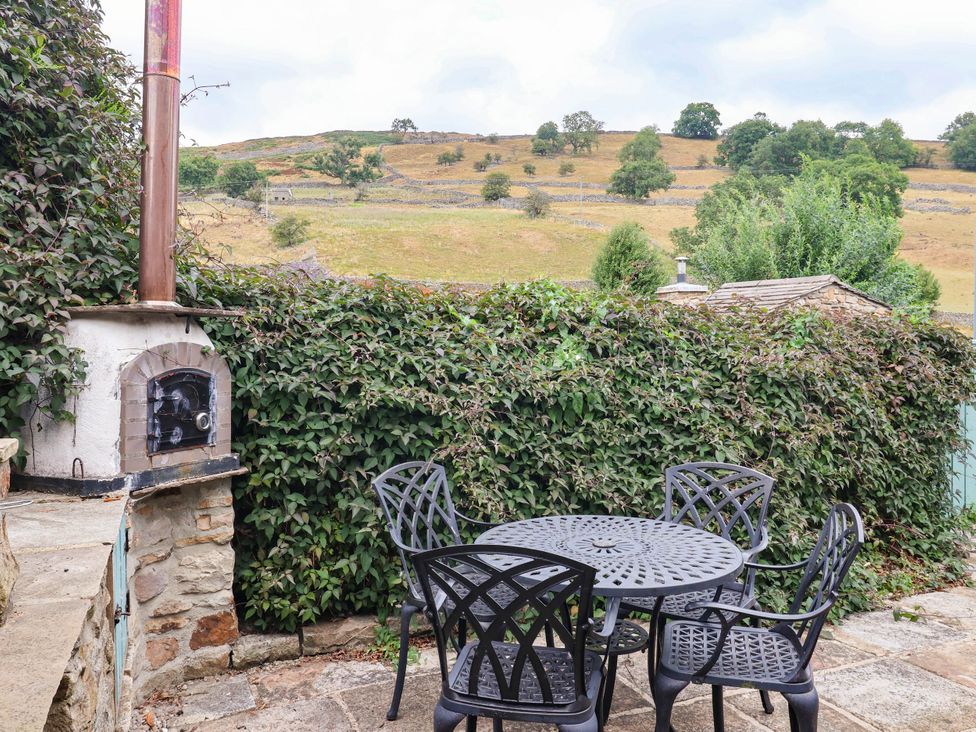 An outdoor seating area with a table and chairs at South View in Richmond