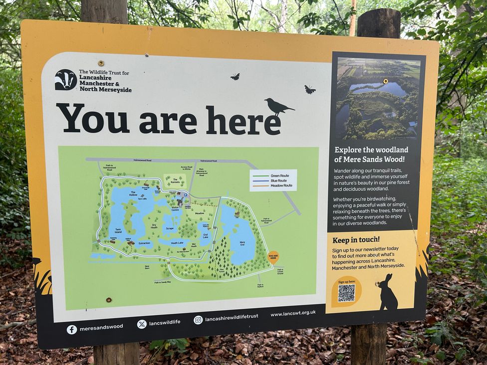 A map sign detailing trails and locations at Mere Sands Wood near Burscough