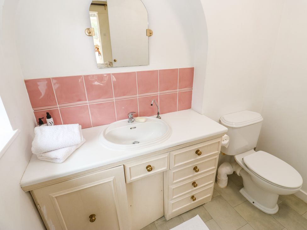 A bathroom with sink and toilet at 12 The Dell in Bardsey near Wetherby