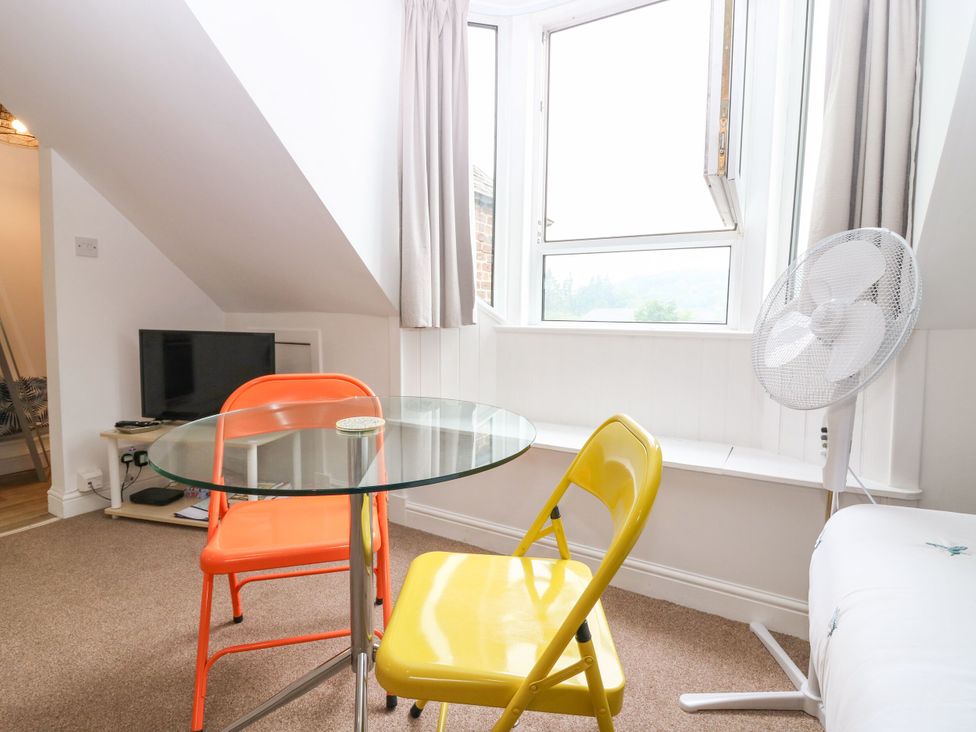 A studio with a table and chairs at Hill View Studio in Hawick