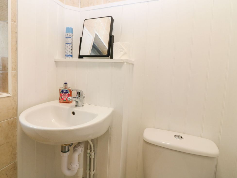 A sink and toilet in a bathroom at Hill View Studio Hawick