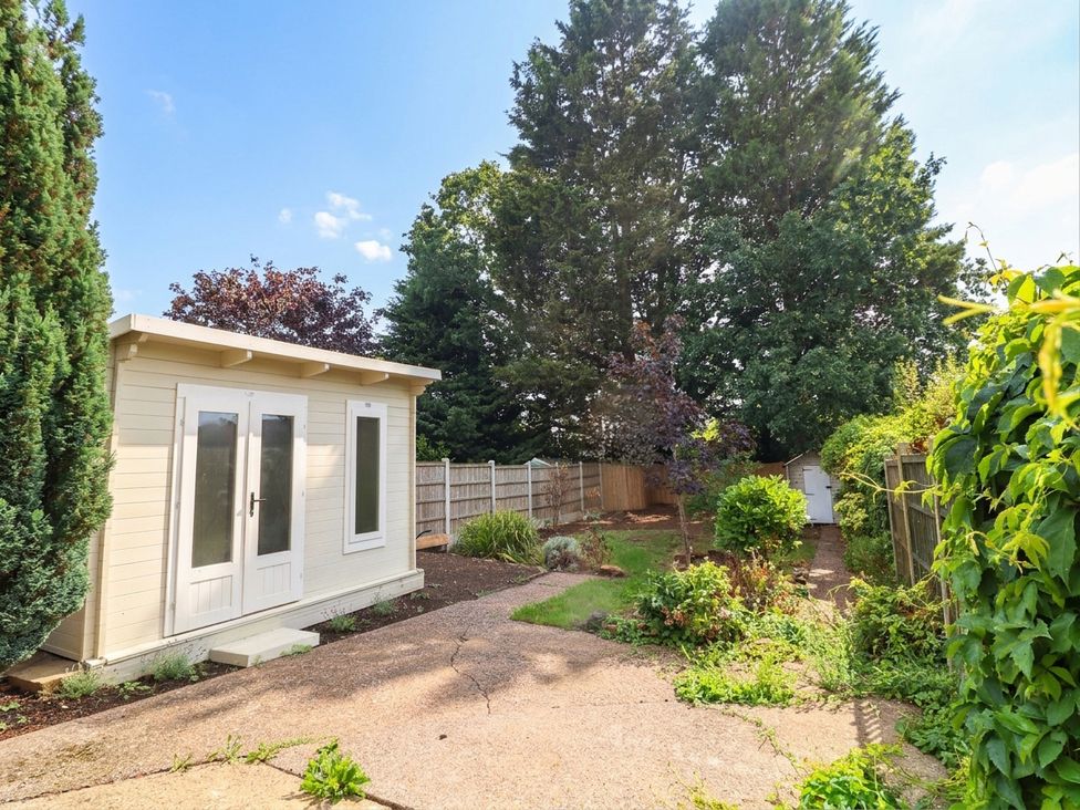 A garden with a shed and trees at No.40 Rufford Road, Ruddington