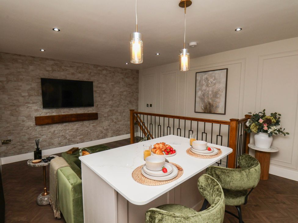 A dining room with table and chairs at 14 Brunswick Street Whitby