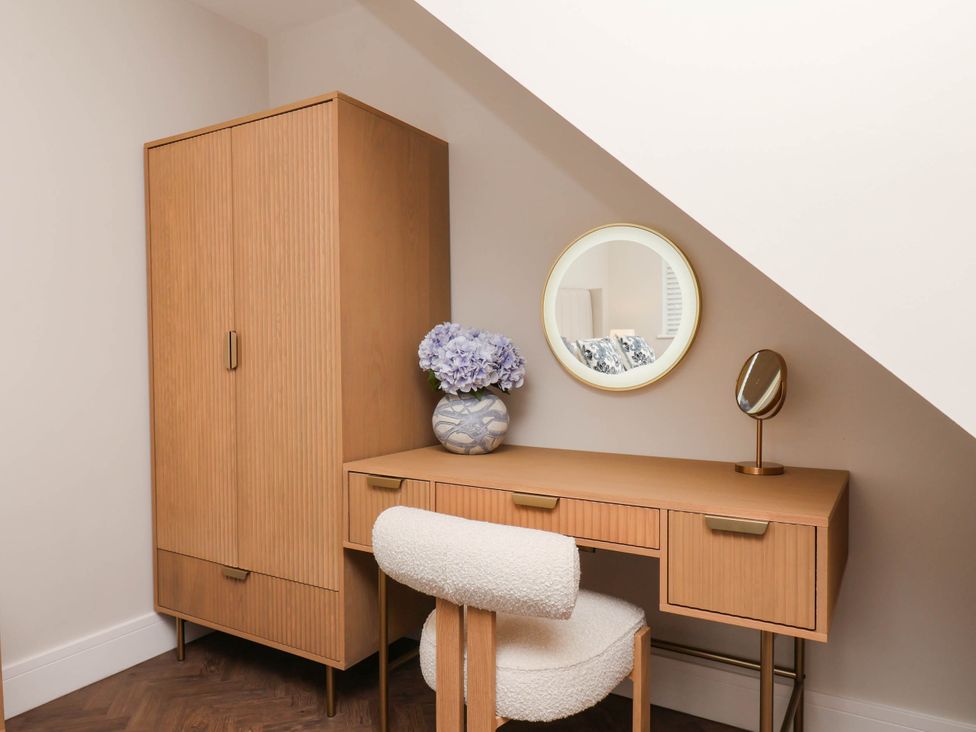 A home office with a desk and chair at 14 Brunswick Street Whitby