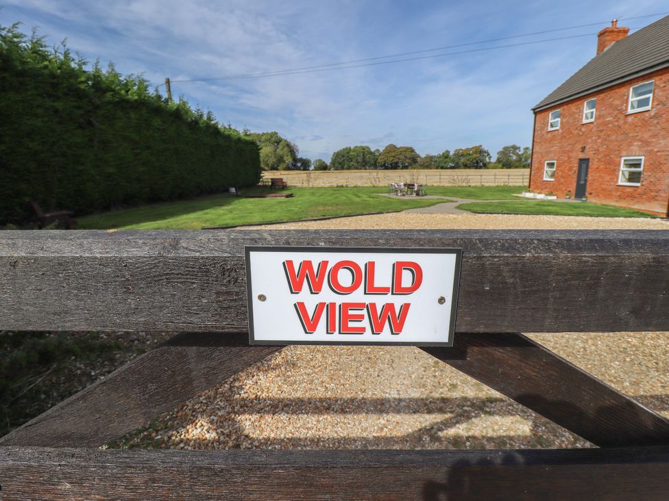 A sign in front of a grass area at Wold View near Caistor