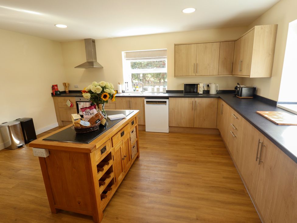 A kitchen with sink and appliances at Wold View near Caistor