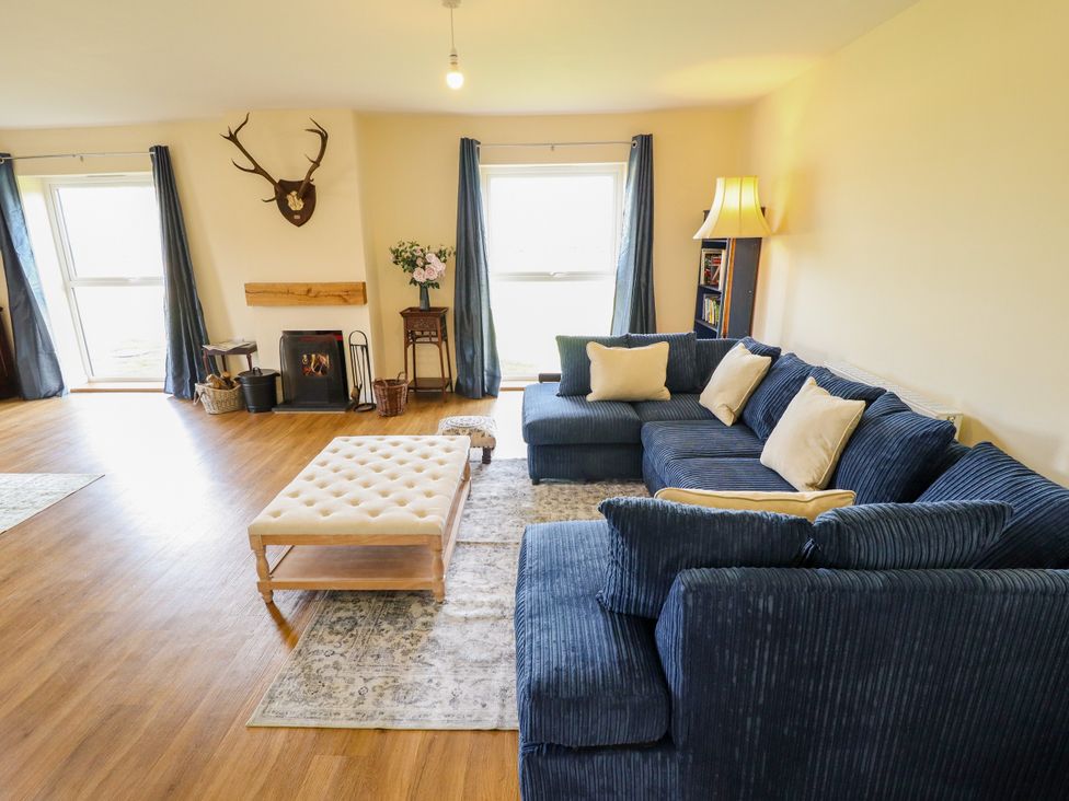 A living room with a coffee table and sofa at Wold View near Caistor