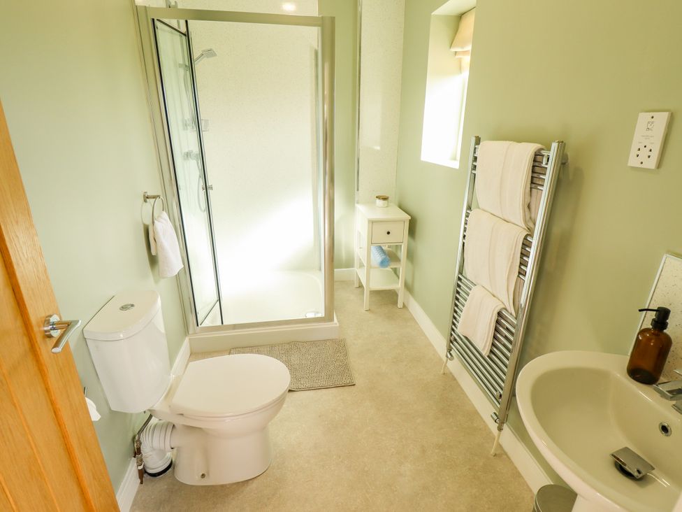 A bathroom with a shower and toilet at Wold View near Caistor