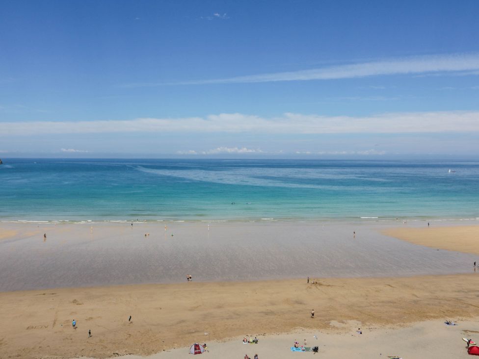 A beach with people enjoying at Seaside Retreat in Newquay