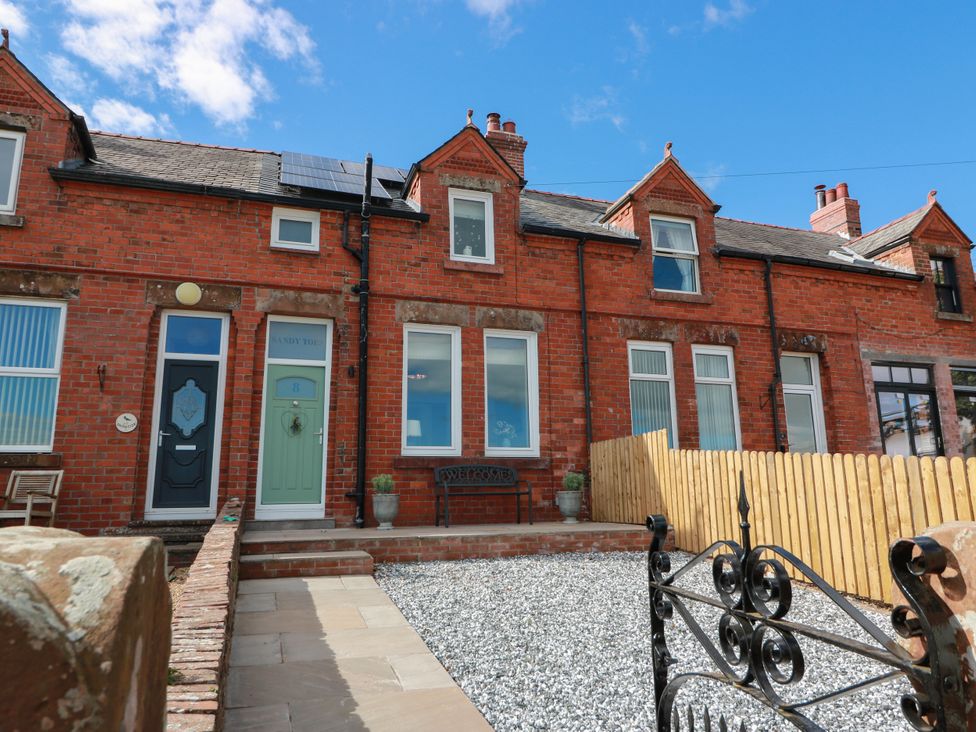 A house exterior with a front door and gravel at Sandy Toes in Powfoot, Annan