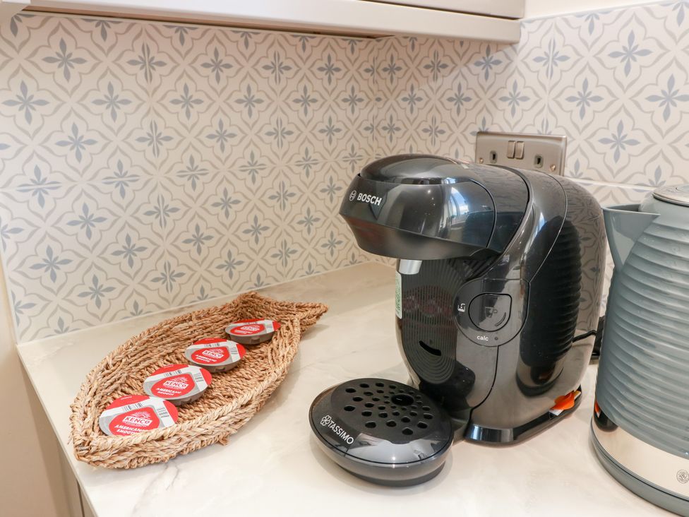 A coffee machine and kettle on the counter at Sandy Toes in Powfoot, Annan