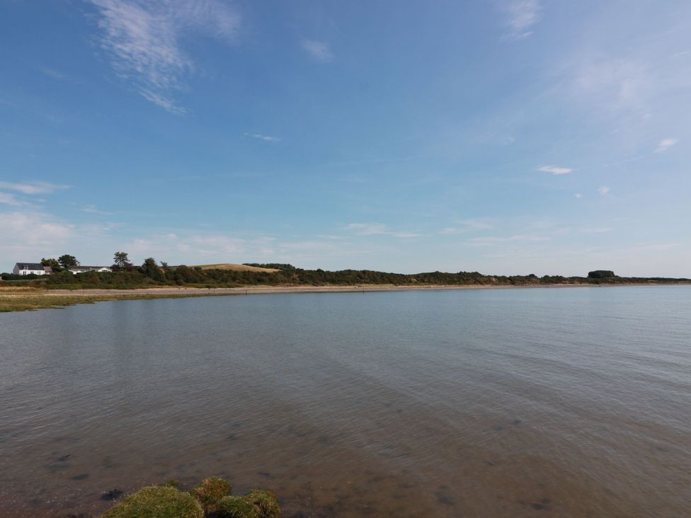 A view of the shoreline and water at Sandy Toes in Powfoot, Annan