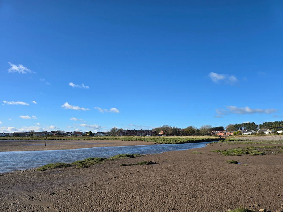 A landscape with water and houses at Sandy Toes in Powfoot, Annan