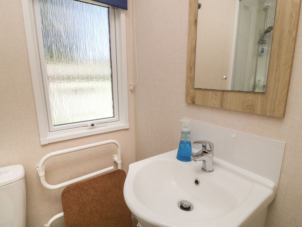 A bathroom with a sink and toilet at Feather Tor in Tavistock