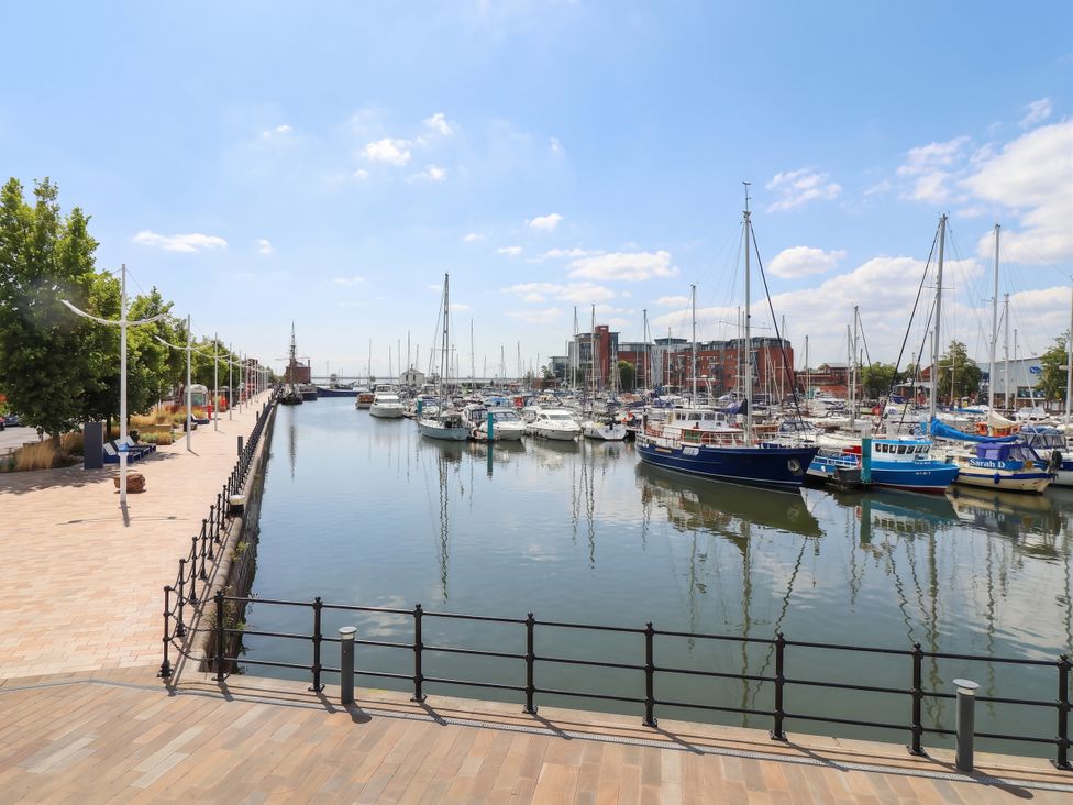 A marina with boats and a pathway at Blanket Row in Hull