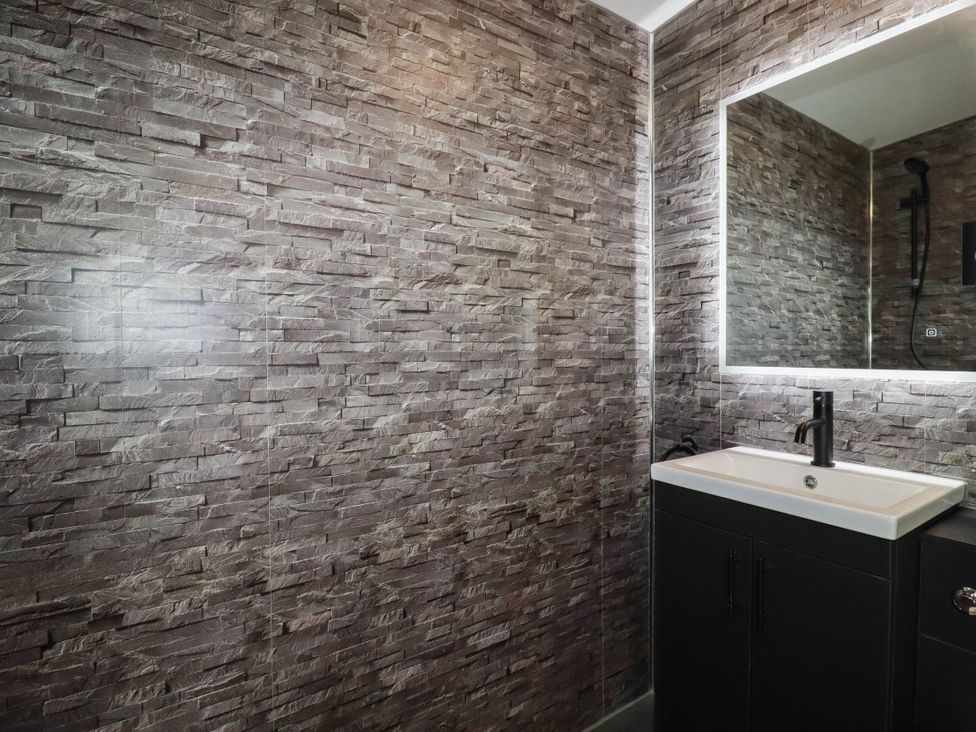 A bathroom with a sink and mirror at The Hyde, Tazamble cottage Launceston