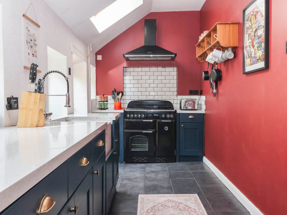 A kitchen with stove and sink at Bowdery in Harrogate