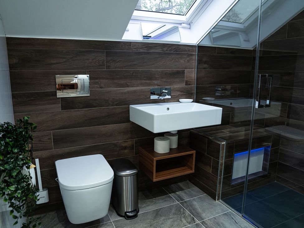 A bathroom with a sink and toilet at the property