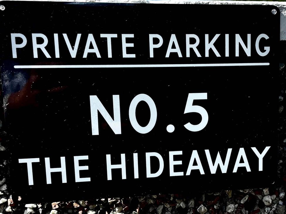 A private parking sign for No. 5 The Hideaway