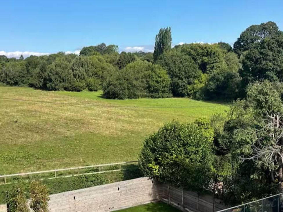 A view of a field and trees at Hot tub  BBQ  Garden Parking  Sleeps 8 Worcester