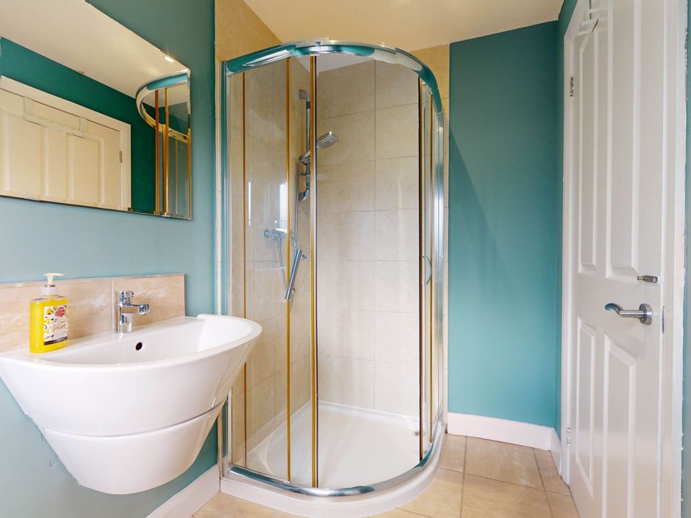 A bathroom with a shower and sink at 5 Bedroom Home Sleeps 16 Ideal for Groups in Epworth