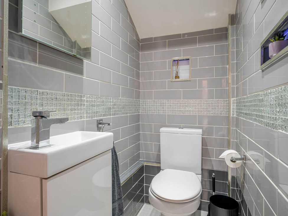 A bathroom with a sink and toilet at Detached House in Quiet Village Pets Allowed Ashbocking near Otley, Suffolk