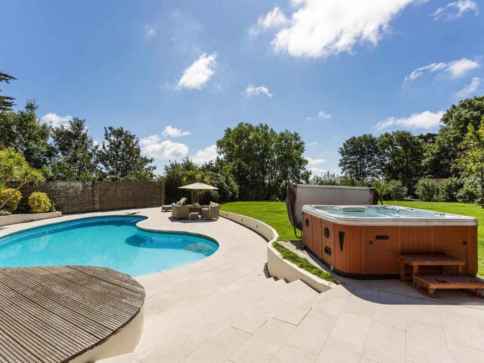An outdoor area with a pool and hot tub at Sleeps 10 to 18 Parking Garden Pool Hot Tub Balcony in Friston