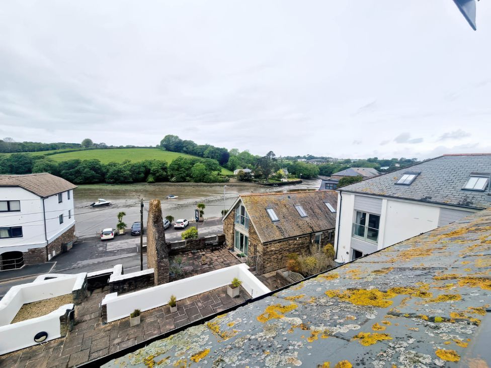 A view of a river and buildings from a balcony at Apartment Sleeps 4 with Balcony and Parking in Kingsbridge