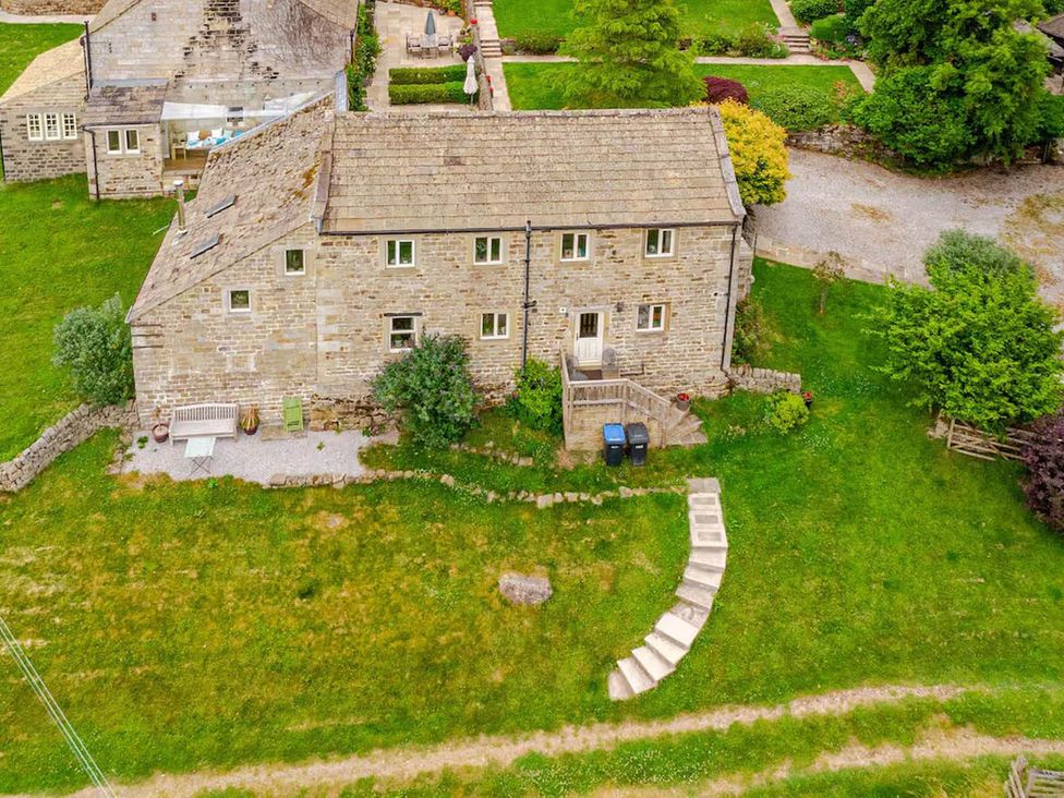 An exterior view of a house with steps and garden at Dowgill 3Bed Barn Sleeps 7 Hot Tub Parking near Summerbridge