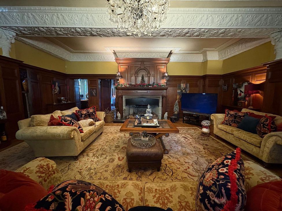 A living room with sofas and a coffee table at the property located in the area