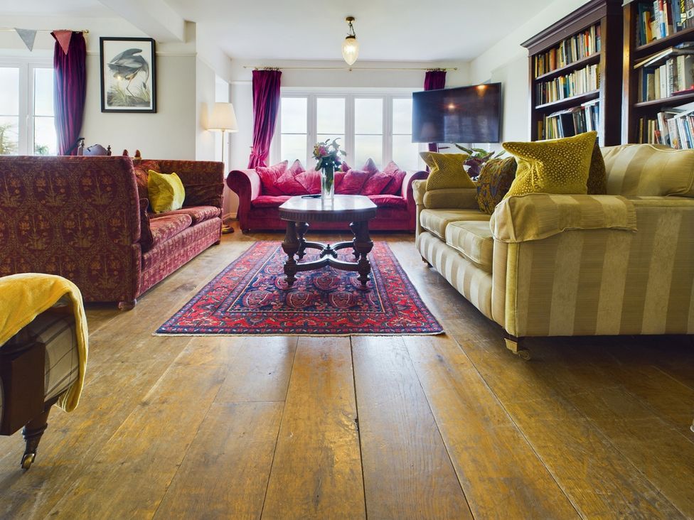 A living room with sofas and a coffee table at Country House 14Guests Parking HotTub AmazingViews Kilgwrrwg near Chepstow
