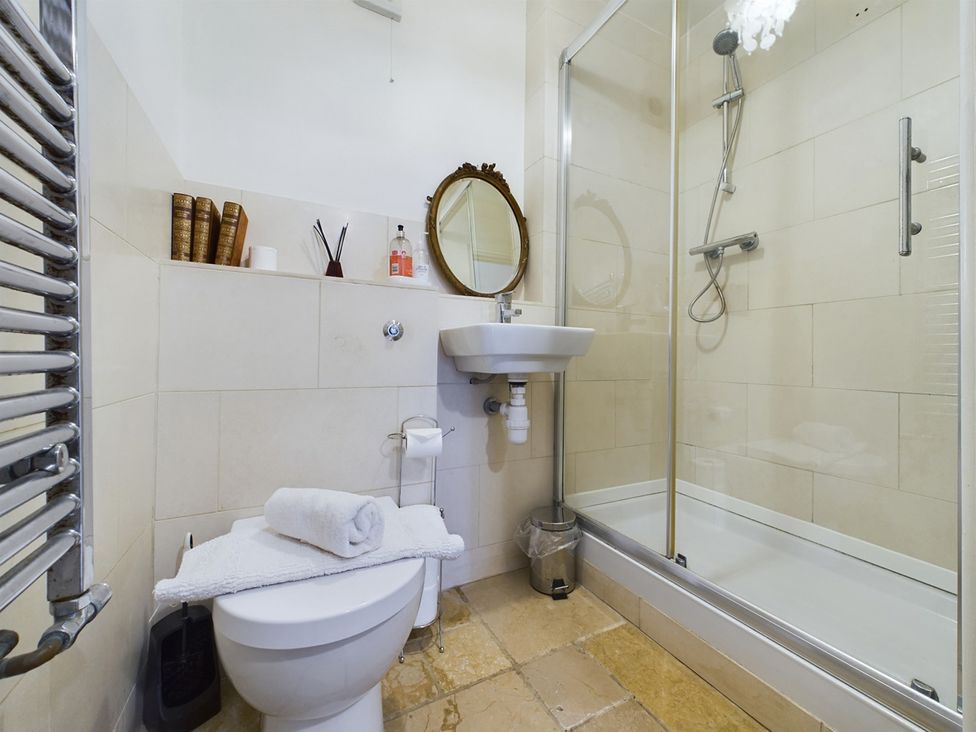 A bathroom with a shower and sink at Country House 14Guests Parking HotTub AmazingViews in Kilgwrrwg near Chepstow