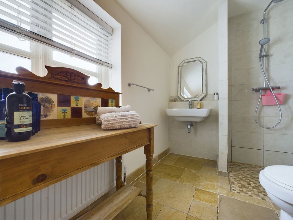 A bathroom with a sink and shower at Country House 14Guests Parking HotTub AmazingViews Kilgwrrwg near Chepstow
