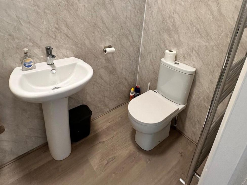 A bathroom with a sink and toilet at Near Beach Parking WiFi Sleeps 2 Lytham St Annes