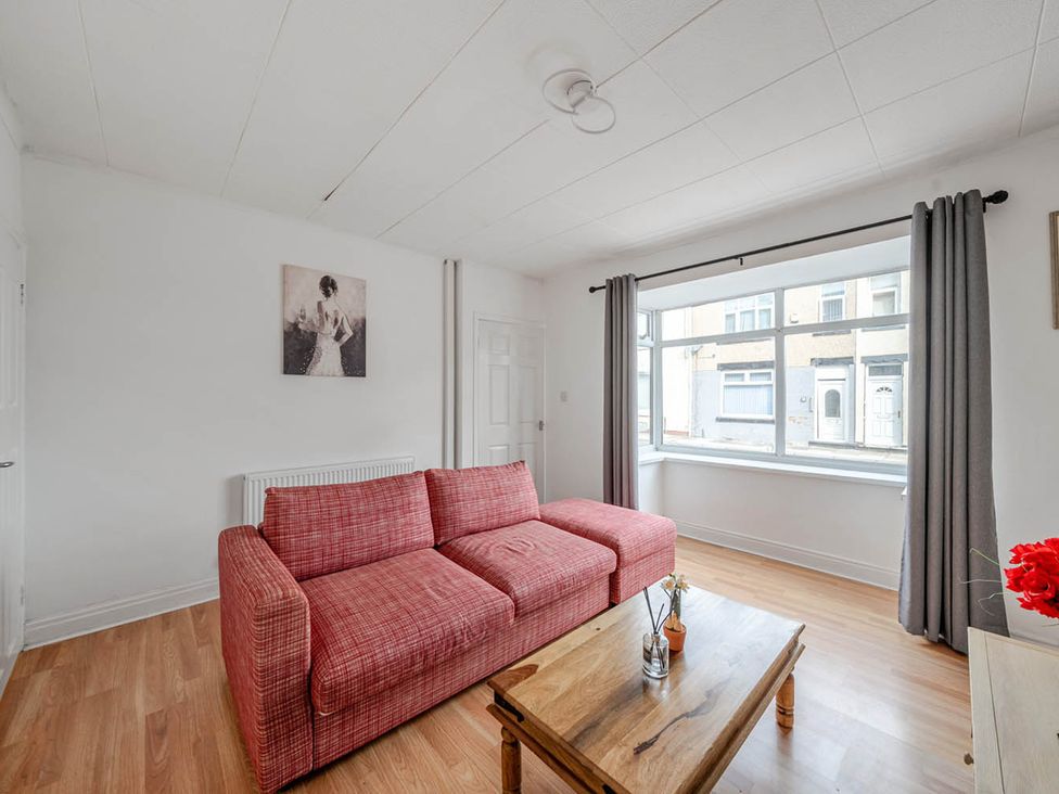 A living room with a sofa and coffee table at Cosy Hartlepool Home Sleeps 5 Pet Friendly WiFi Hartlepool