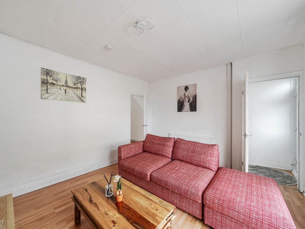 A living room with a sofa and coffee table at Cosy Hartlepool Home Sleeps 5 Pet Friendly WiFi in Hartlepool