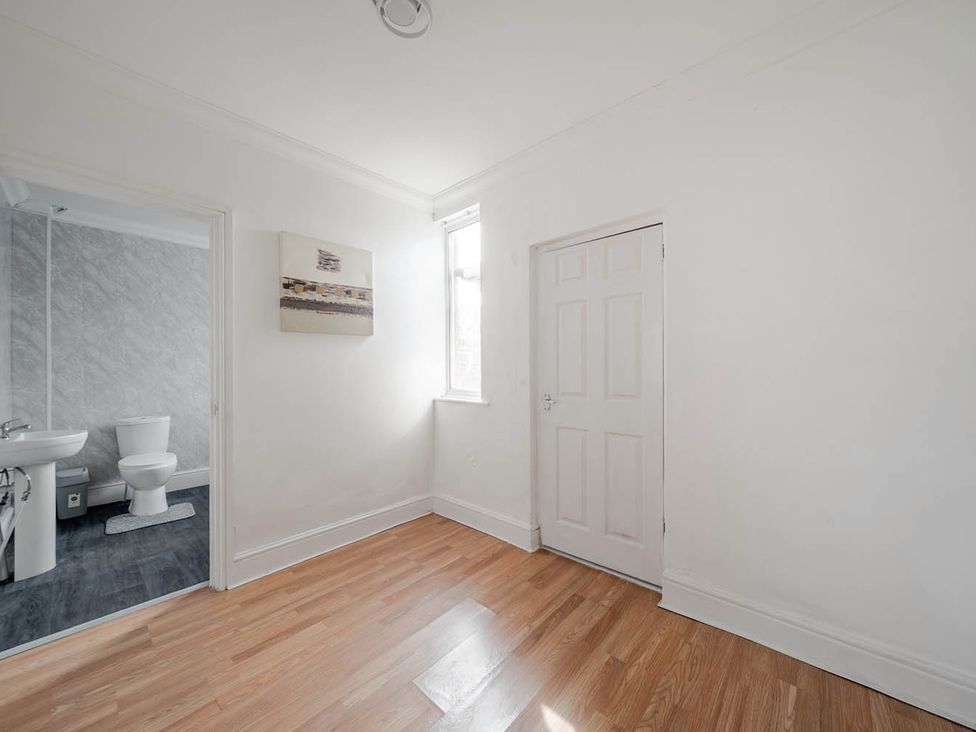 A bathroom featuring a toilet and sink at Cosy Hartlepool Home Sleeps 5 Pet Friendly WiFi Hartlepool