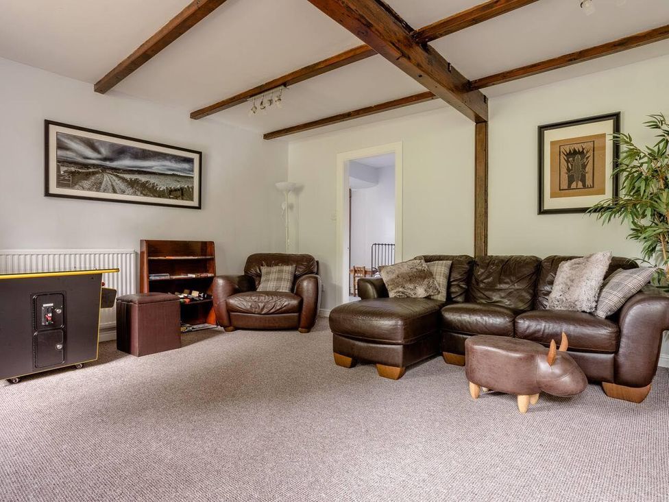 A living room with a sofa and chair at OldMill 2Bed Sleeps6 PrivateGarden OptionalHotTub in Oakworth