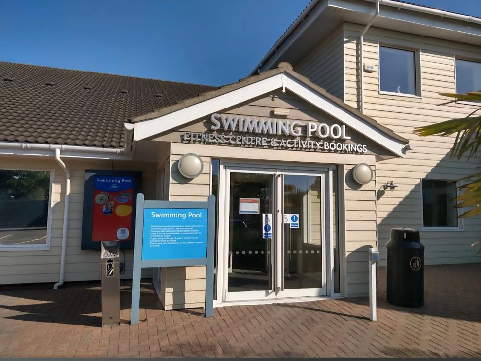 An entrance to a swimming pool facility at Homely Caravan in Skegness