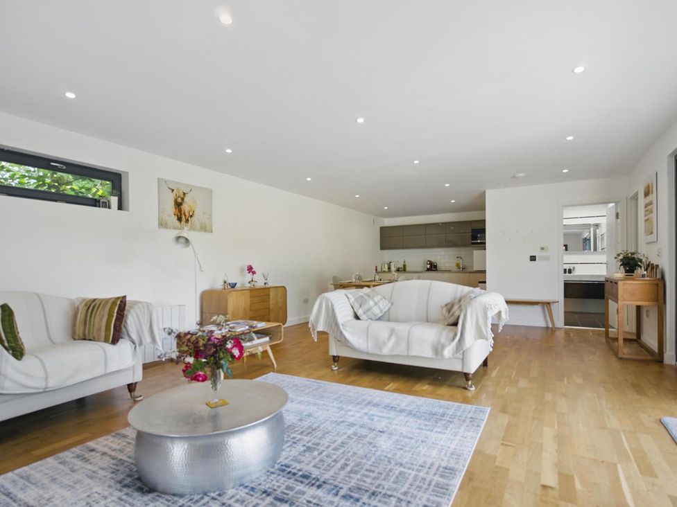 A living room with a sofa and coffee table at Tyler Hill near Canterbury