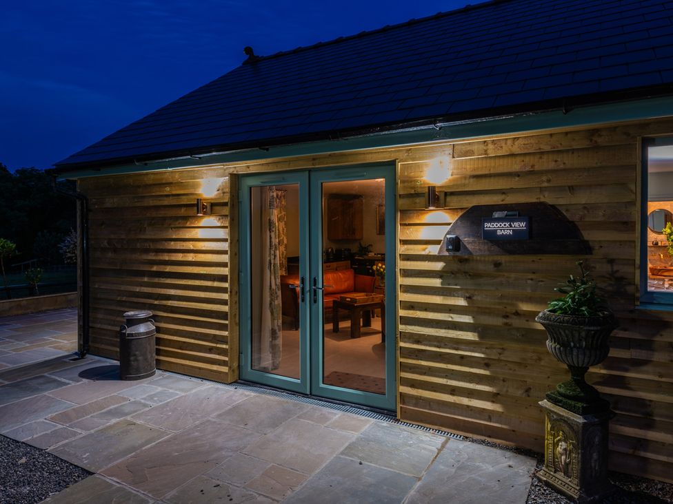 An entrance area with a door and sign at Paddock View Barn at Duffryn Lloff Farm near Cowbridge