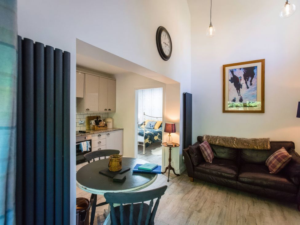A living room with a table and sofa at Oakley Country Retreat1 Bed Garden Free Parking in Nantwich