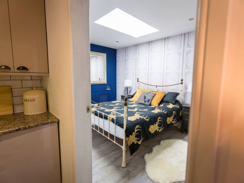 A bedroom with a bed and bedside table at Oakley Country Retreat1 Bed Garden Free Parking in Nantwich