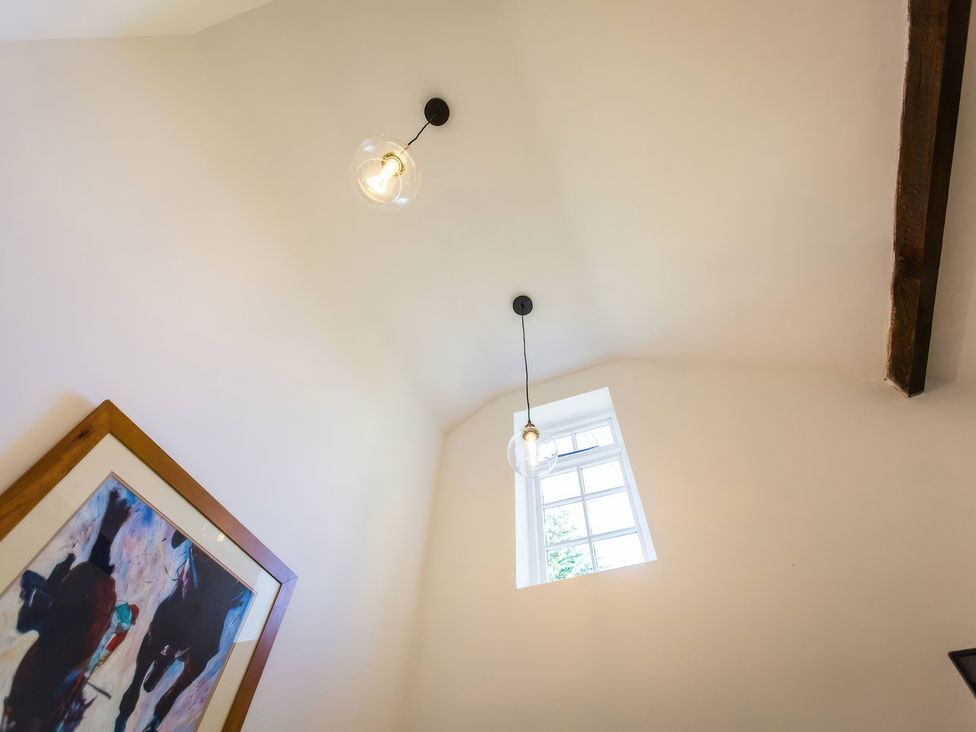 A ceiling with light fixtures and a window at Oakley Country Retreat 1 Bed Garden Free Parking Nantwich